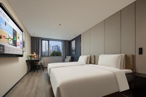 Imagen de la habitación del Hotel Atour Shanghai Lujiazui South Pudong Road. Foto 17