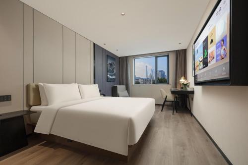 Imagen de la habitación del Hotel Atour Shanghai Lujiazui South Pudong Road. Foto 20