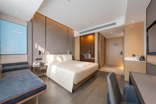 Imagen de la habitación del Hotel Atour Shanghai Pudong Airport Chuansha Station. Foto 14