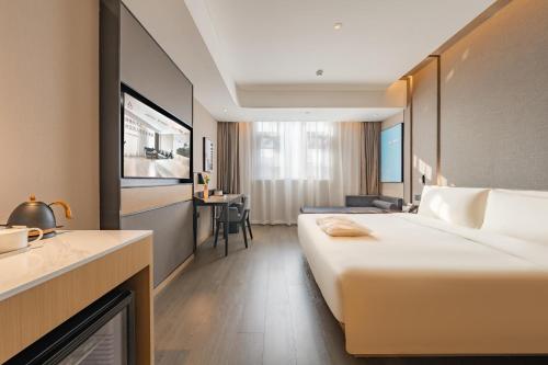 Imagen de la habitación del Hotel Atour Shanghai Pudong Airport Chuansha Station. Foto 15