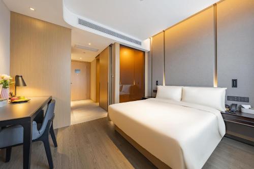 Imagen de la habitación del Hotel Atour Shanghai Pudong Airport Chuansha Station. Foto 17
