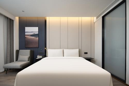 Imagen de la habitación del Hotel Atour Shanghai Pudong Airport Zhunan Road. Foto 18