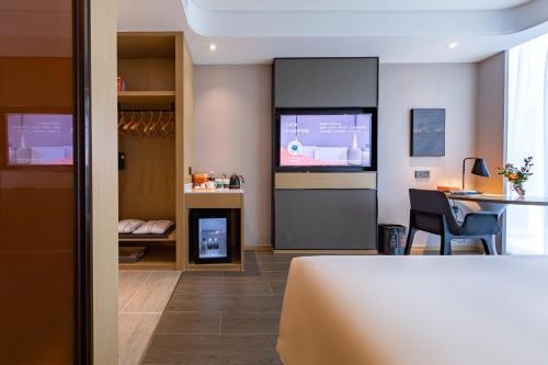 Imagen de la habitación del Hotel Atour Shanghai Wujiaochang Daxue Road. Foto 14