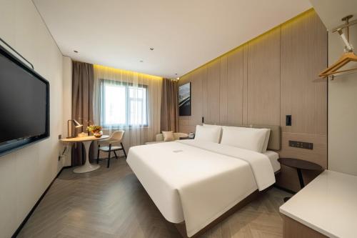 Imagen de la habitación del Hotel Atour Shanghai Wujiaochang West Yingao Road Station. Foto 11