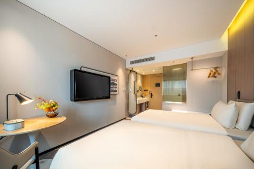 Imagen de la habitación del Hotel Atour Shanghai Wujiaochang West Yingao Road Station. Foto 17