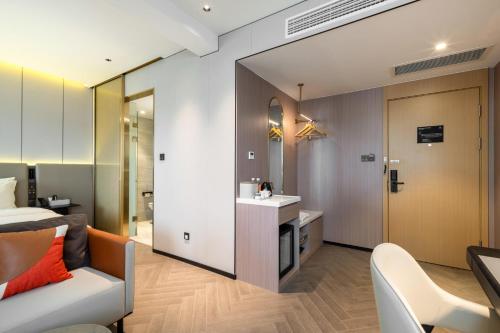 Imagen de la habitación del Hotel Atour Shanghai Wujiaochang West Yingao Road Station. Foto 19