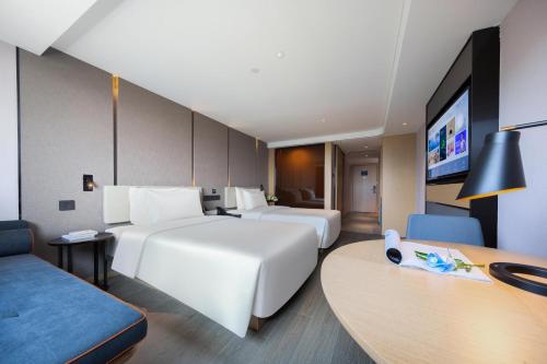 Imagen de la habitación del Hotel Atour Shanghai Xinzhuang CBD. Foto 14