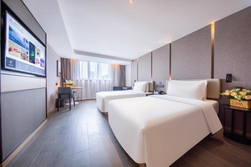 Imagen de la habitación del Hotel Atour Shanghai Xinzhuang CBD. Foto 17
