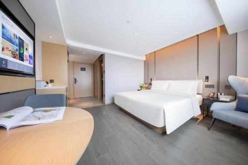 Imagen de la habitación del Hotel Atour Shanghai Xinzhuang CBD. Foto 18
