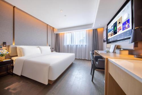 Imagen de la habitación del Hotel Atour Shanghai Xinzhuang CBD. Foto 19