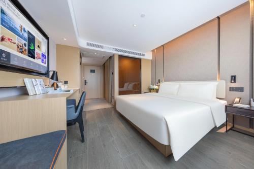 Imagen de la habitación del Hotel Atour Shanghai Xinzhuang CBD. Foto 20
