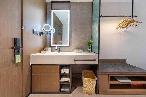 Imagen de la habitación del Hotel Atour Shanwei High-Speed Railway Station Binhai Park. Foto 14