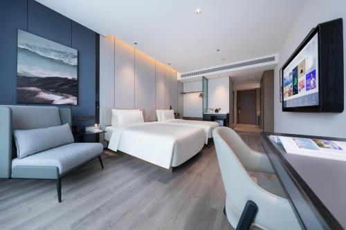 Imagen de la habitación del Hotel Atour Shanwei High-Speed Railway Station Binhai Park. Foto 15