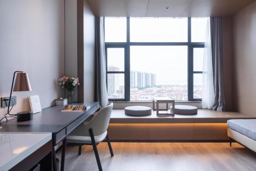 Imagen de la habitación del Hotel Atour Shanwei High-Speed Railway Station Binhai Park. Foto 18