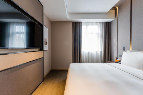 Imagen de la habitación del Hotel Atour Shengzhou. Foto 19