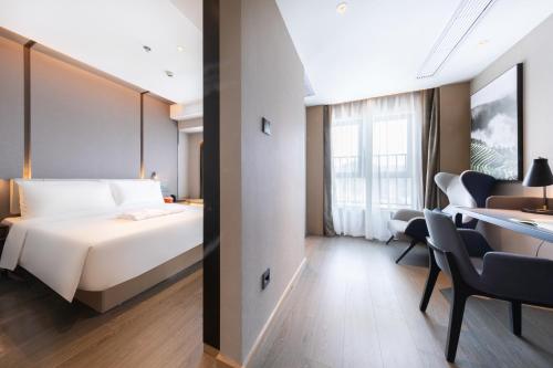 Imagen de la habitación del Hotel Atour Shenzhen Guangming Science City Zhengda City. Foto 11