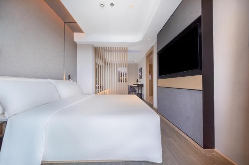 Imagen de la habitación del Hotel Atour Shenzhen Guangming Science City Zhengda City. Foto 20