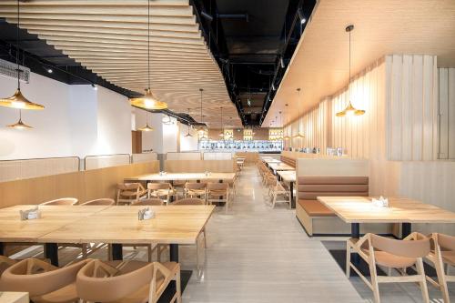 Imagen del bar/restaurante del Hotel Atour Shenzhen Nanshan Vanke Yuncheng. Foto 8