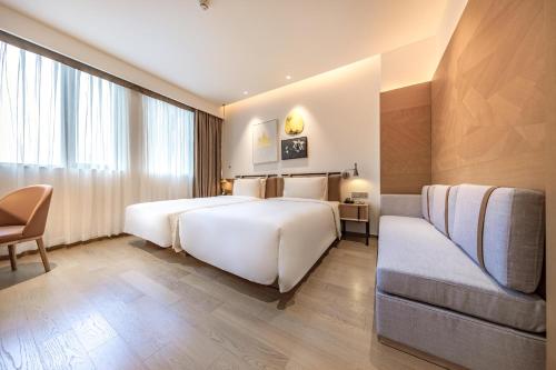 Imagen de la habitación del Hotel Atour Shenzhen Nanshan Vanke Yuncheng. Foto 13