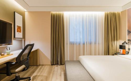 Imagen de la habitación del Hotel Atour South Bund Shanghai. Foto 4