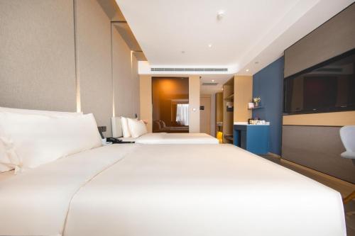 Imagen de la habitación del Hotel Atour South Jinan Industrial Road CBD. Foto 16
