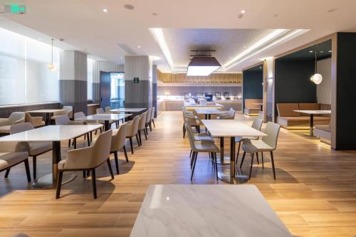 Imagen del bar/restaurante del Hotel Atour Suqian Industrial Park Wuyue Plaza. Foto 10