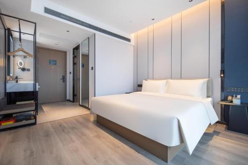 Imagen de la habitación del Hotel Atour Suqian Industrial Park Wuyue Plaza. Foto 11