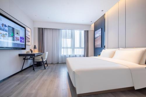 Imagen de la habitación del Hotel Atour Suqian Industrial Park Wuyue Plaza. Foto 12