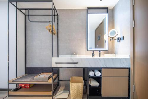 Imagen de la habitación del Hotel Atour Suqian Industrial Park Wuyue Plaza. Foto 14