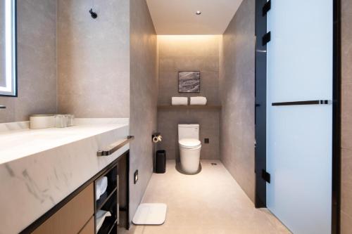 Imagen de la habitación del Hotel Atour Suqian Industrial Park Wuyue Plaza. Foto 16
