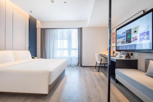 Imagen de la habitación del Hotel Atour Suqian Industrial Park Wuyue Plaza. Foto 18