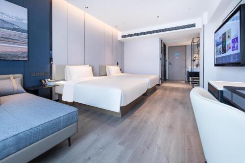 Imagen de la habitación del Hotel Atour Suqian Industrial Park Wuyue Plaza. Foto 19