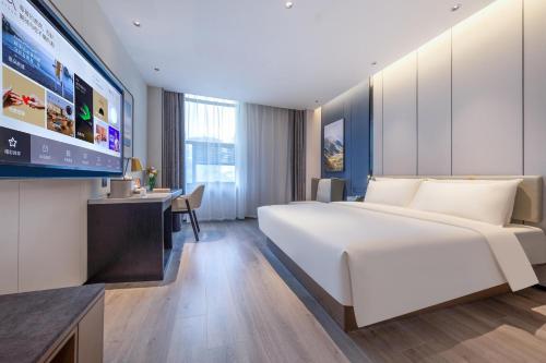 Imagen de la habitación del Hotel Atour Suqian West Lake Road Golden Eagle Plaza. Foto 13