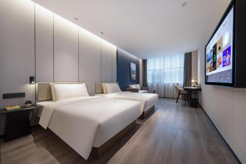 Imagen de la habitación del Hotel Atour Suqian West Lake Road Golden Eagle Plaza. Foto 19
