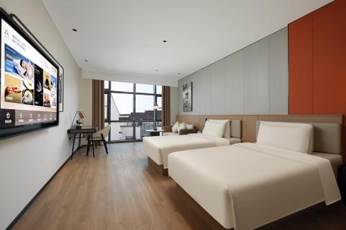 Imagen de la habitación del Hotel Atour Suzhou Beisi Pagoda Taohuawu Street. Foto 19
