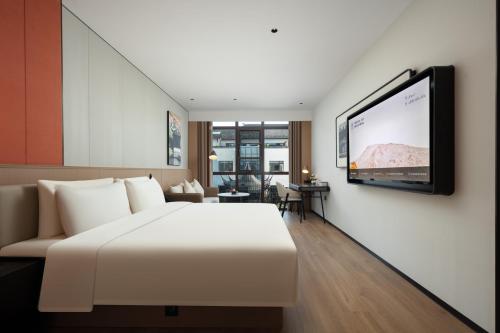 Imagen de la habitación del Hotel Atour Suzhou Beisi Pagoda Taohuawu Street. Foto 20