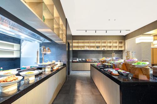 Imagen del bar/restaurante del Hotel Atour Suzhou Beisi Pagoda Taohuawu Street. Foto 18