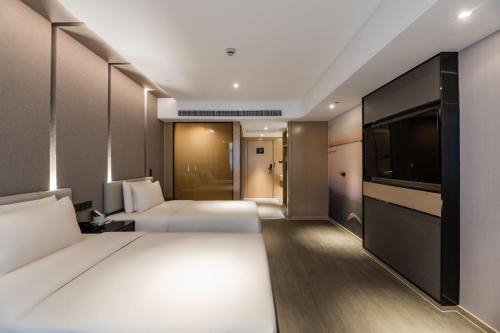 Imagen de la habitación del Hotel Atour Suzhou Guanqian Street. Foto 12