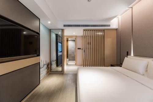 Imagen de la habitación del Hotel Atour Suzhou Guanqian Street. Foto 13