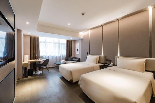 Imagen de la habitación del Hotel Atour Suzhou Guanqian Street. Foto 15