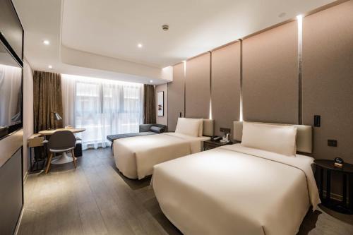 Imagen de la habitación del Hotel Atour Suzhou Guanqian Street. Foto 16