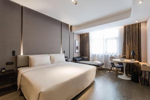 Imagen de la habitación del Hotel Atour Suzhou Guanqian Street. Foto 17