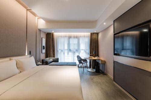 Imagen de la habitación del Hotel Atour Suzhou Guanqian Street. Foto 18