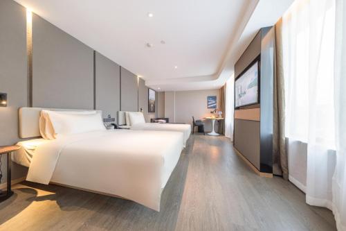 Imagen de la habitación del Hotel Atour Suzhou Guanqian Street Leqiao Station. Foto 11