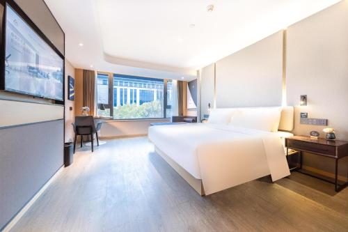 Imagen de la habitación del Hotel Atour Suzhou Guanqian Street Leqiao Station. Foto 13