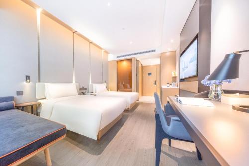 Imagen de la habitación del Hotel Atour Suzhou Guanqian Street Leqiao Station. Foto 15