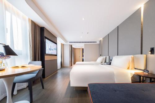 Imagen de la habitación del Hotel Atour Suzhou Guanqian Street Leqiao Station. Foto 16