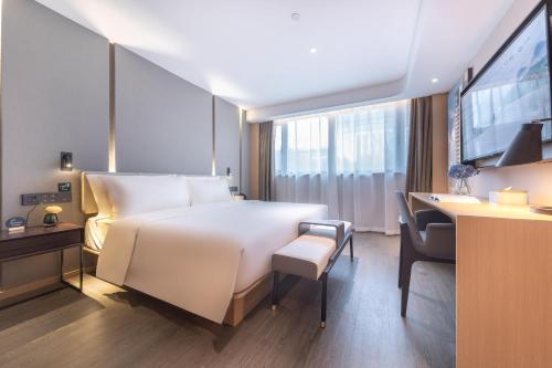 Imagen de la habitación del Hotel Atour Suzhou Guanqian Street Leqiao Station. Foto 17