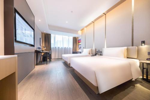 Imagen de la habitación del Hotel Atour Suzhou Guanqian Street Leqiao Station. Foto 19