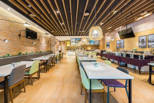 Imagen del bar/restaurante del Hotel Atour Suzhou Wangting. Foto 13